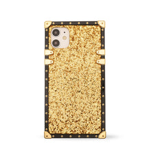 Load image into Gallery viewer, Gold glittery iphone case by Maison Purity with black border and gold accents on a white background
