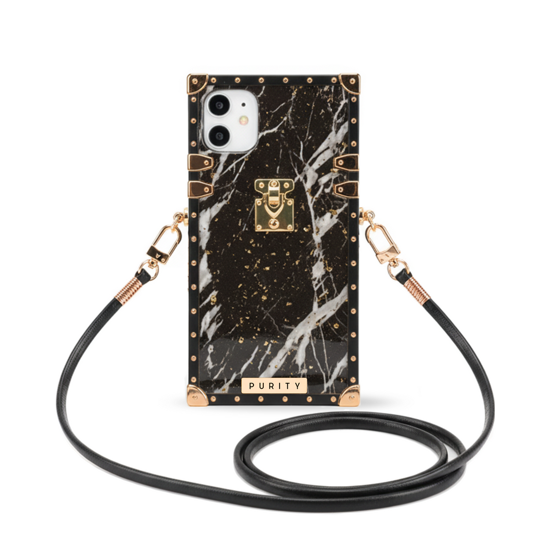 Black marble iPhone case by PURITY with gold accents and a crossbody strap.