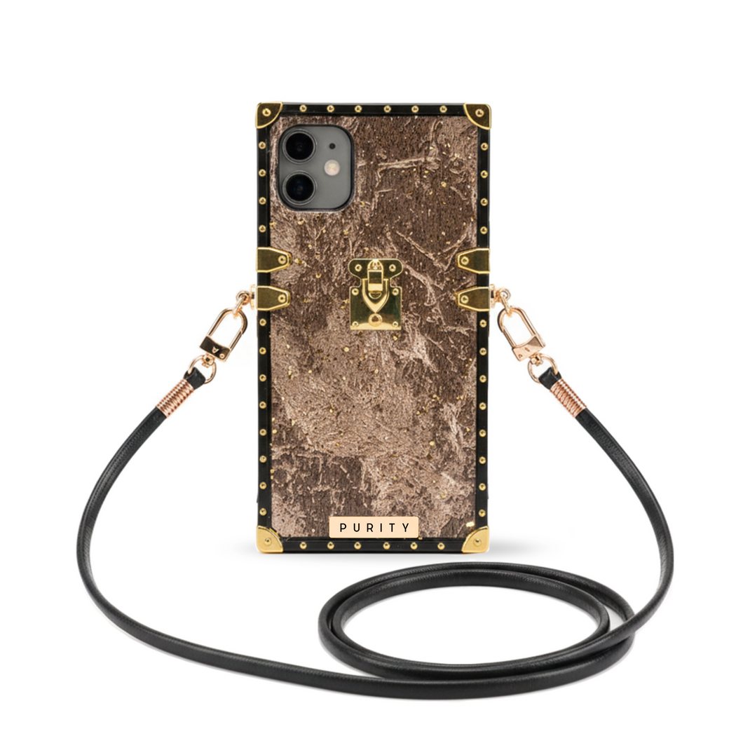 Brown marble iPhone case with black leather crossbody strap.