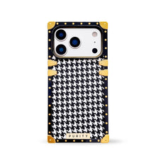 Load image into Gallery viewer, Luxury iPhone 17 Pro case with black and white houndstooth pattern and gold accents by Maison Purity on a white background
