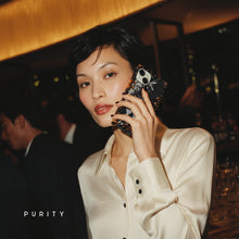 Load image into Gallery viewer, Luxury iPhone case with black snake skin pattern and gold accents by PURITY.
